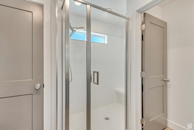 full bathroom featuring a stall shower