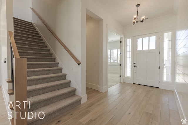 3783 S Kennedy Ln, Washington, UT 84780 - foyer with a chandelier and light hardwood / wood-style flooring