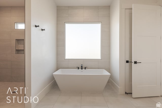 3783 S Kennedy Ln, Washington, UT 84780 - bathroom with a tub to relax in, tile patterned flooring, and plenty of natural light