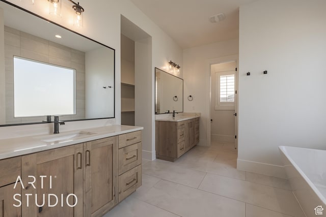 3783 S Kennedy Ln, Washington, UT 84780 - bathroom featuring a bath, tile patterned floors, and vanity