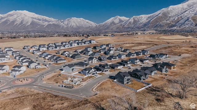 bird's eye view featuring a mountain view and a residential view
