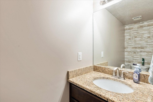 1841 E Whitetail Dr, Layton, UT 84040 - bathroom with vanity and a textured ceiling