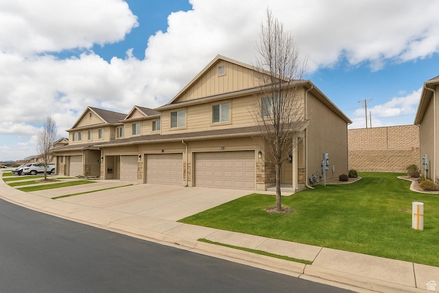 1841 E Whitetail Dr, Layton, UT 84040 - view of front facade with board and batten siding, driveway, a garage, a front lawn, and stone siding
