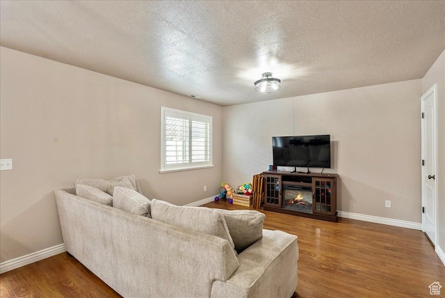 1841 E Whitetail Dr, Layton, UT 84040 - living area featuring wood finished floors and a textured ceiling