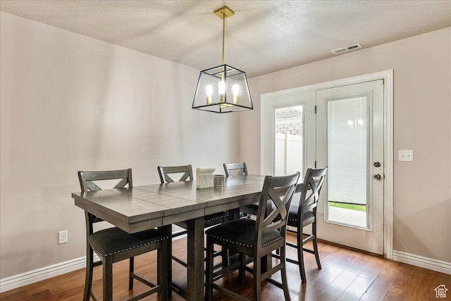 1841 E Whitetail Dr, Layton, UT 84040 - dining room with wood finished floors and a chandelier