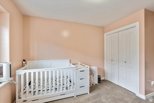 1841 E Whitetail Dr, Layton, UT 84040 - carpeted bedroom with a closet and a nursery area