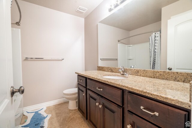 1841 E Whitetail Dr, Layton, UT 84040 - bathroom with vanity, toilet, baseboards, curtained shower, and tile patterned floors