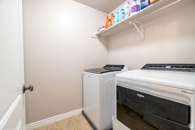 1841 E Whitetail Dr, Layton, UT 84040 - laundry area with washing machine and dryer, baseboards, and tile patterned floors