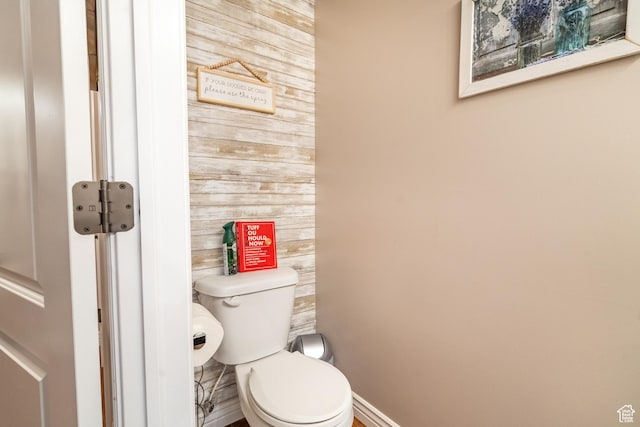 1841 E Whitetail Dr, Layton, UT 84040 - bathroom featuring toilet, wooden walls, and baseboards