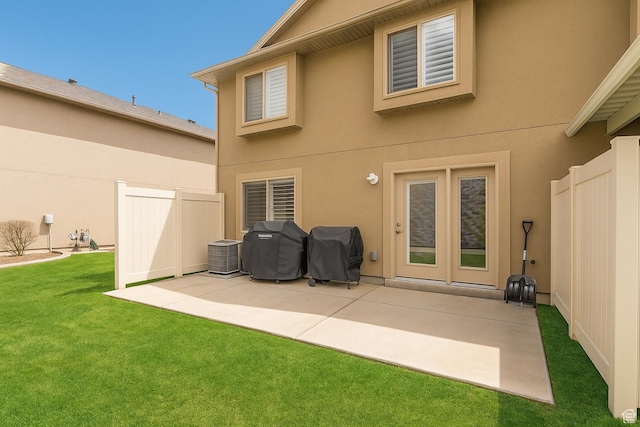 1841 E Whitetail Dr, Layton, UT 84040 - back of property with a patio, stucco siding, and cooling unit