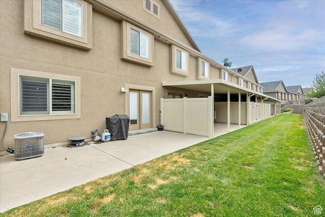 1841 E Whitetail Dr, Layton, UT 84040 - back of house featuring a patio area and stucco siding