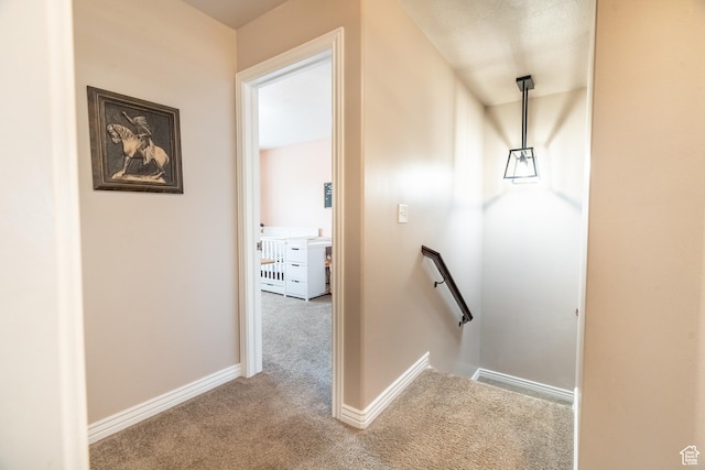 1841 E Whitetail Dr, Layton, UT 84040 - hall featuring carpet floors, an upstairs landing, and baseboards