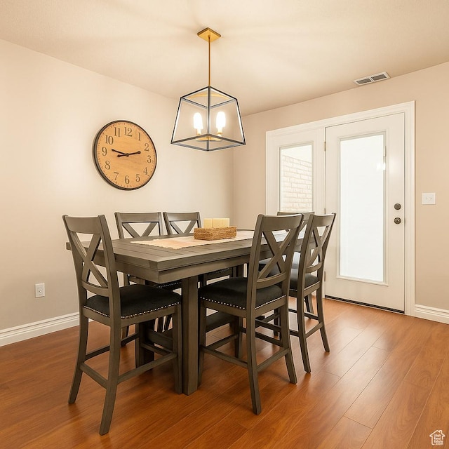1841 E Whitetail Dr, Layton, UT 84040 - dining area featuring wood finished floors and baseboards