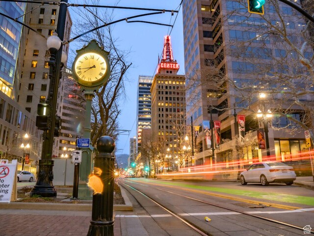 view of road featuring sidewalks and a view of city