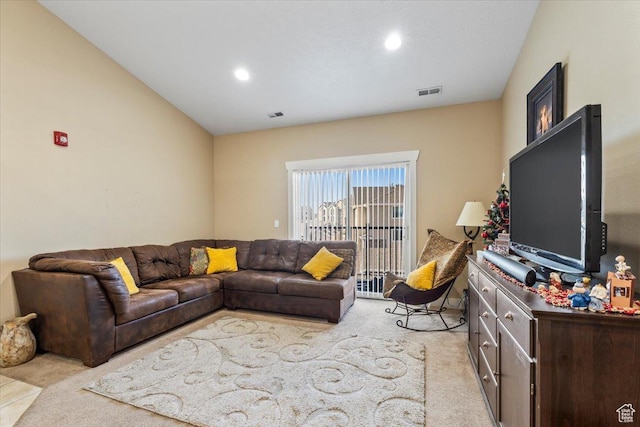 living room featuring light carpet