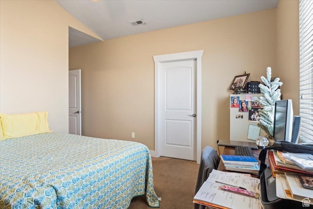 bedroom featuring multiple windows, carpet, and lofted ceiling