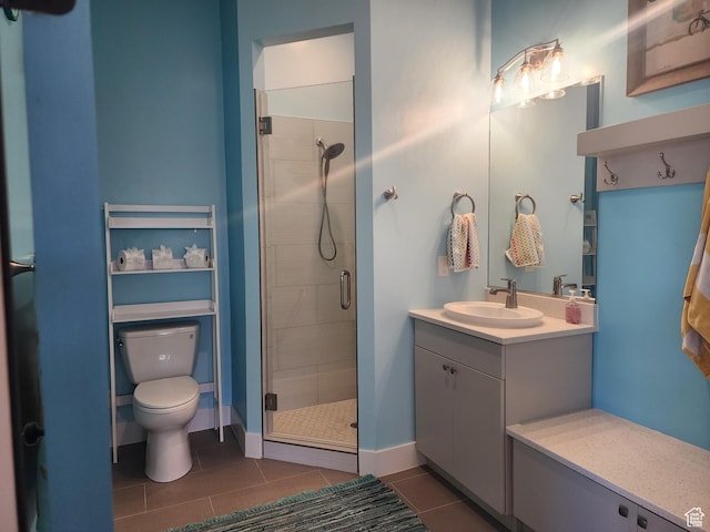 1283 N Gallen Rd W, Santa Clara, UT 84765 - bathroom with toilet, tile patterned flooring, a shower with shower door, and vanity