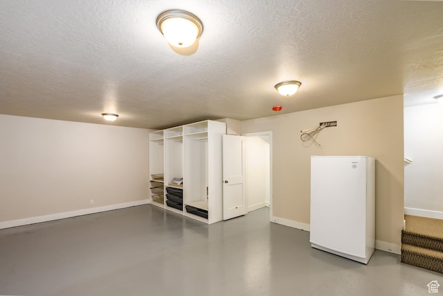 1283 N Gallen Rd W, Santa Clara, UT 84765 - basement with white fridge and a textured ceiling