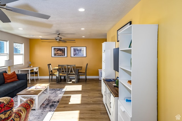 1283 N Gallen Rd W, Santa Clara, UT 84765 - living room featuring a textured ceiling, ceiling fan, and dark hardwood / wood-style flooring