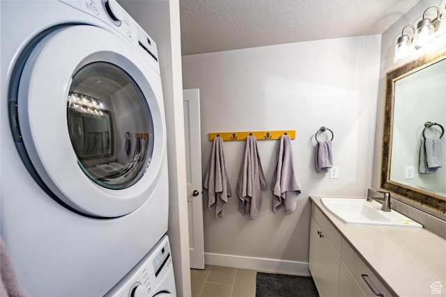 1283 N Gallen Rd W, Santa Clara, UT 84765 - interior space with stacked washer / dryer, tile patterned flooring, vanity, and a textured ceiling