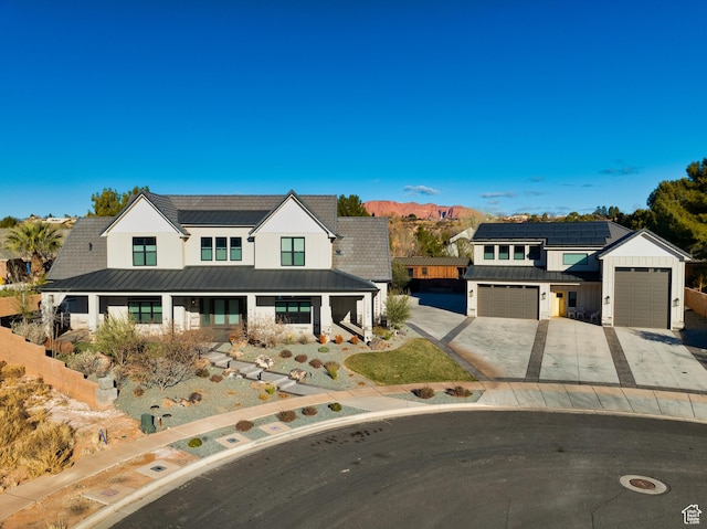 modern inspired farmhouse with a mountain view