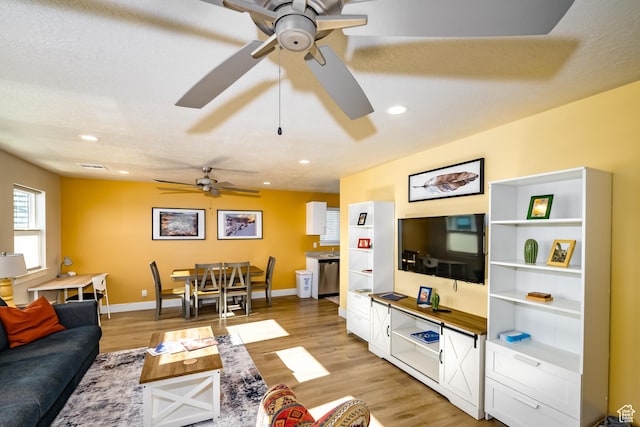 1283 N Gallen Rd W, Santa Clara, UT 84765 - living room featuring a textured ceiling, ceiling fan, and light hardwood / wood-style floors