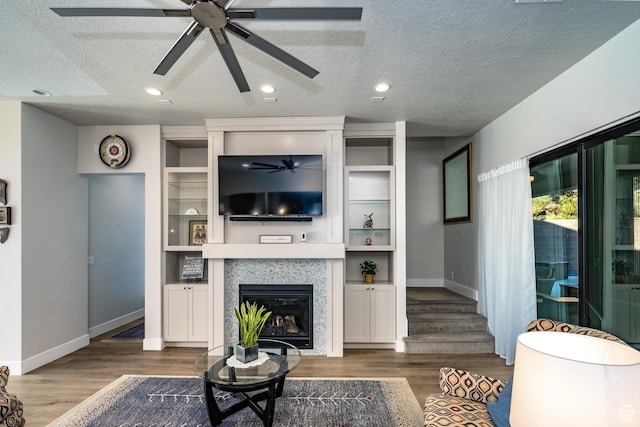 1283 N Gallen Rd W, Santa Clara, UT 84765 - living room with a textured ceiling, dark hardwood / wood-style flooring, and a tiled fireplace