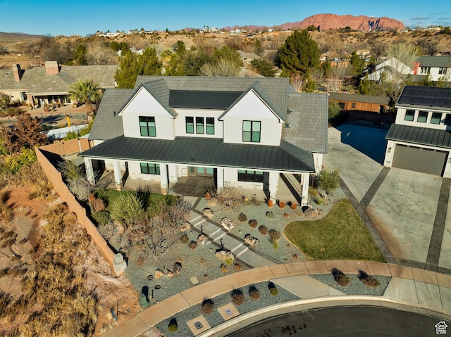 1283 N Gallen Rd W, Santa Clara, UT 84765 - view of front of house featuring a garage and a mountain view