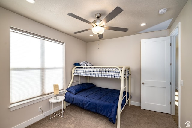 1283 N Gallen Rd W, Santa Clara, UT 84765 - carpeted bedroom with a textured ceiling, ceiling fan, and multiple windows