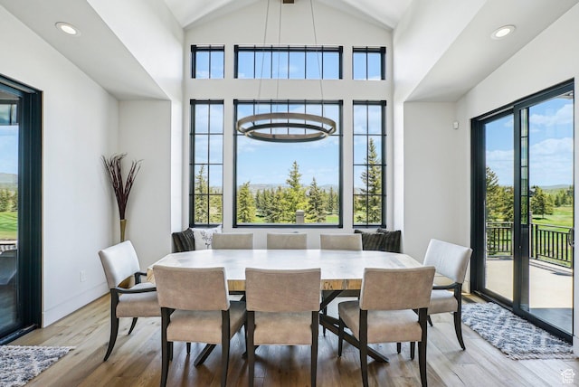 7242 Lupine Dr, Park City, UT 84098 - dining space with wood finished floors, vaulted ceiling, recessed lighting, and baseboards