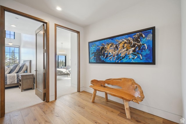 7242 Lupine Dr, Park City, UT 84098 - hallway featuring light wood-style flooring, baseboards, and recessed lighting
