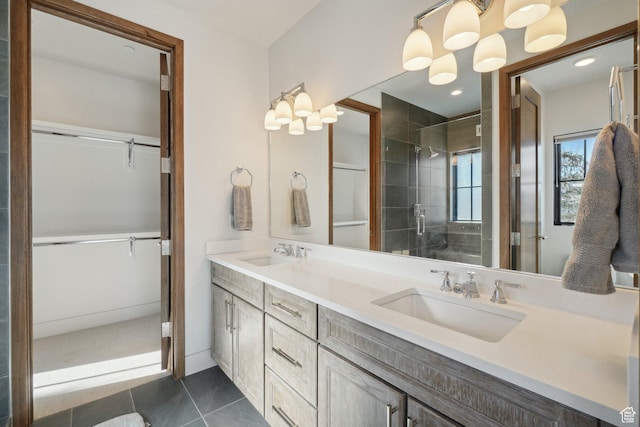 7242 Lupine Dr, Park City, UT 84098 - bathroom featuring double vanity, a shower stall, and a walk in closet