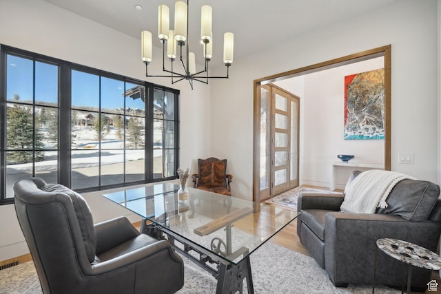 7242 Lupine Dr, Park City, UT 84098 - living room featuring a chandelier, plenty of natural light, french doors, and wood finished floors