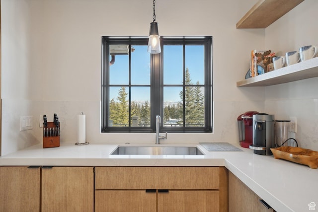 7242 Lupine Dr, Park City, UT 84098 - kitchen featuring a sink, light countertops, decorative light fixtures, open shelves, and backsplash