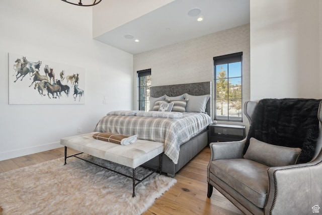 7242 Lupine Dr, Park City, UT 84098 - bedroom featuring multiple windows, light wood-type flooring, baseboards, and recessed lighting