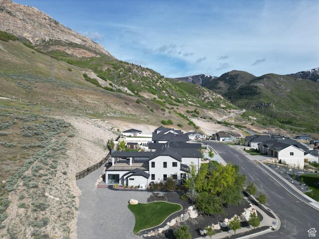 aerial view featuring a mountain view and a residential view