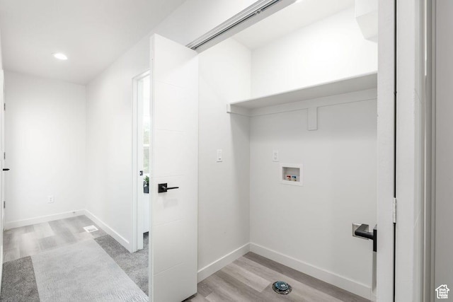 328 E 3390 S Unit 11, South Salt Lake, UT 84115 - clothes washing area with washer hookup and light wood-type flooring