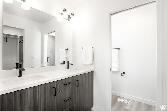 328 E 3390 S Unit 11, South Salt Lake, UT 84115 - bathroom featuring vanity and wood-type flooring