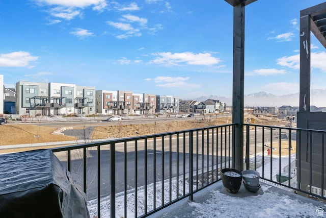 balcony featuring a mountain view