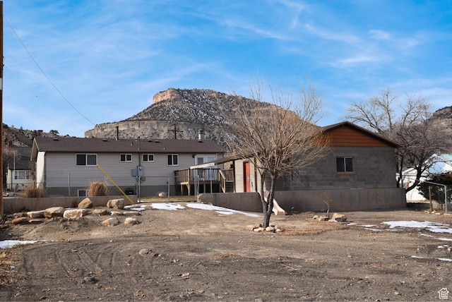 rear view of house with a mountain view