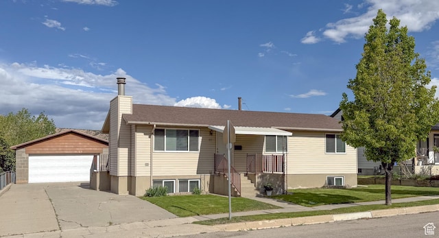 87 Bryner St, Helper, UT 84526 - view of front of home featuring an outdoor structure, a detached garage, a chimney, and a front yard