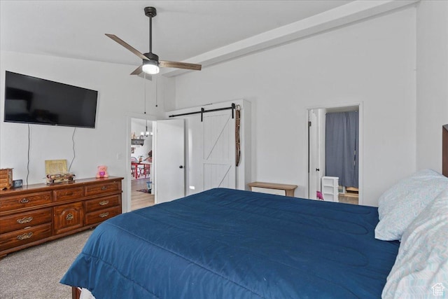 5507 S 1150 W, Riverdale, UT 84405 - carpeted bedroom with a barn door, vaulted ceiling, and a ceiling fan