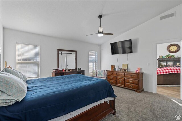 5507 S 1150 W, Riverdale, UT 84405 - carpeted bedroom with vaulted ceiling and ceiling fan