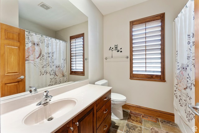 337 E Brayden Way, Draper, UT 84020 - bathroom with vanity, a healthy amount of sunlight, and toilet