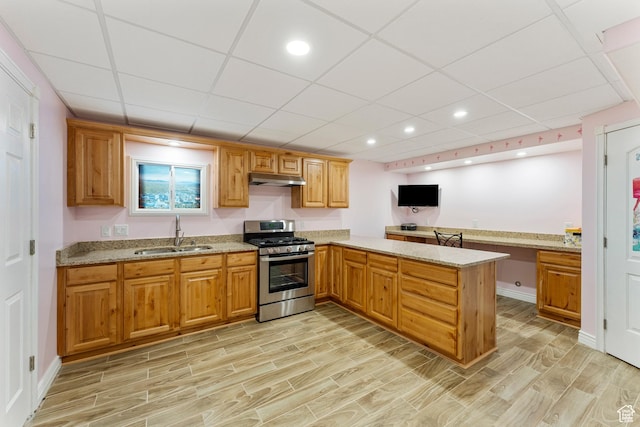 337 E Brayden Way, Draper, UT 84020 - kitchen featuring light stone counters, stainless steel range with gas cooktop, kitchen peninsula, and sink