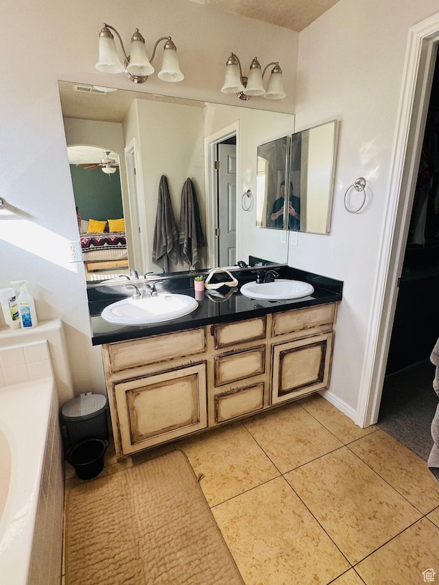 173 E Fidllers Canyon Rd Unit 17, Cedar City, UT 84721 - full bath featuring a sink, ensuite bathroom, double vanity, and tile patterned floors