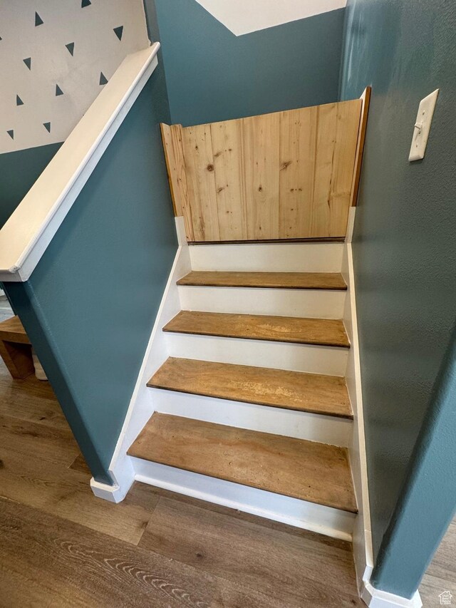 173 E Fidllers Canyon Rd Unit 17, Cedar City, UT 84721 - staircase featuring baseboards and wood finished floors
