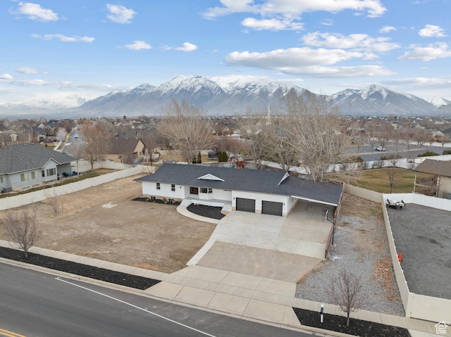 1455 E 100 S, Spanish Fork, UT 84660 - view of front of property featuring fence, a mountain view, a residential view, concrete driveway, and an attached garage