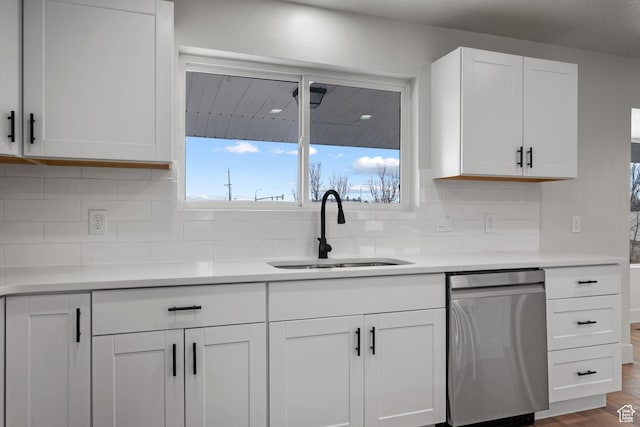 1455 E 100 S, Spanish Fork, UT 84660 - kitchen with backsplash, dishwasher, light countertops, white cabinets, and a sink