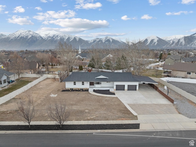 1455 E 100 S, Spanish Fork, UT 84660 - view of front of home with concrete driveway, a mountain view, a garage, and a residential view